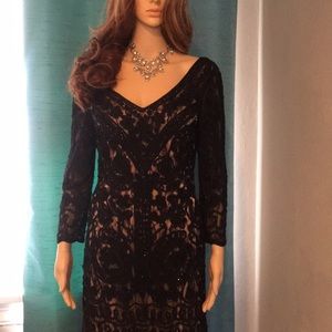Beautiful cut out lace black cocktail dress